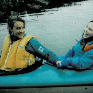 A woman with a disability and her sister kayaking